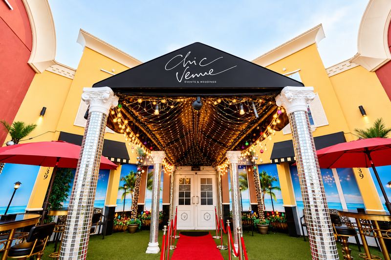 Covered entrance with red carpet